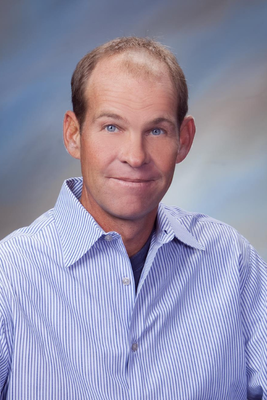 Portrait of John Dosher, Broker/REALTOR®.
