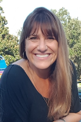 Portrait of Kris Beasley, Broker/REALTOR®.